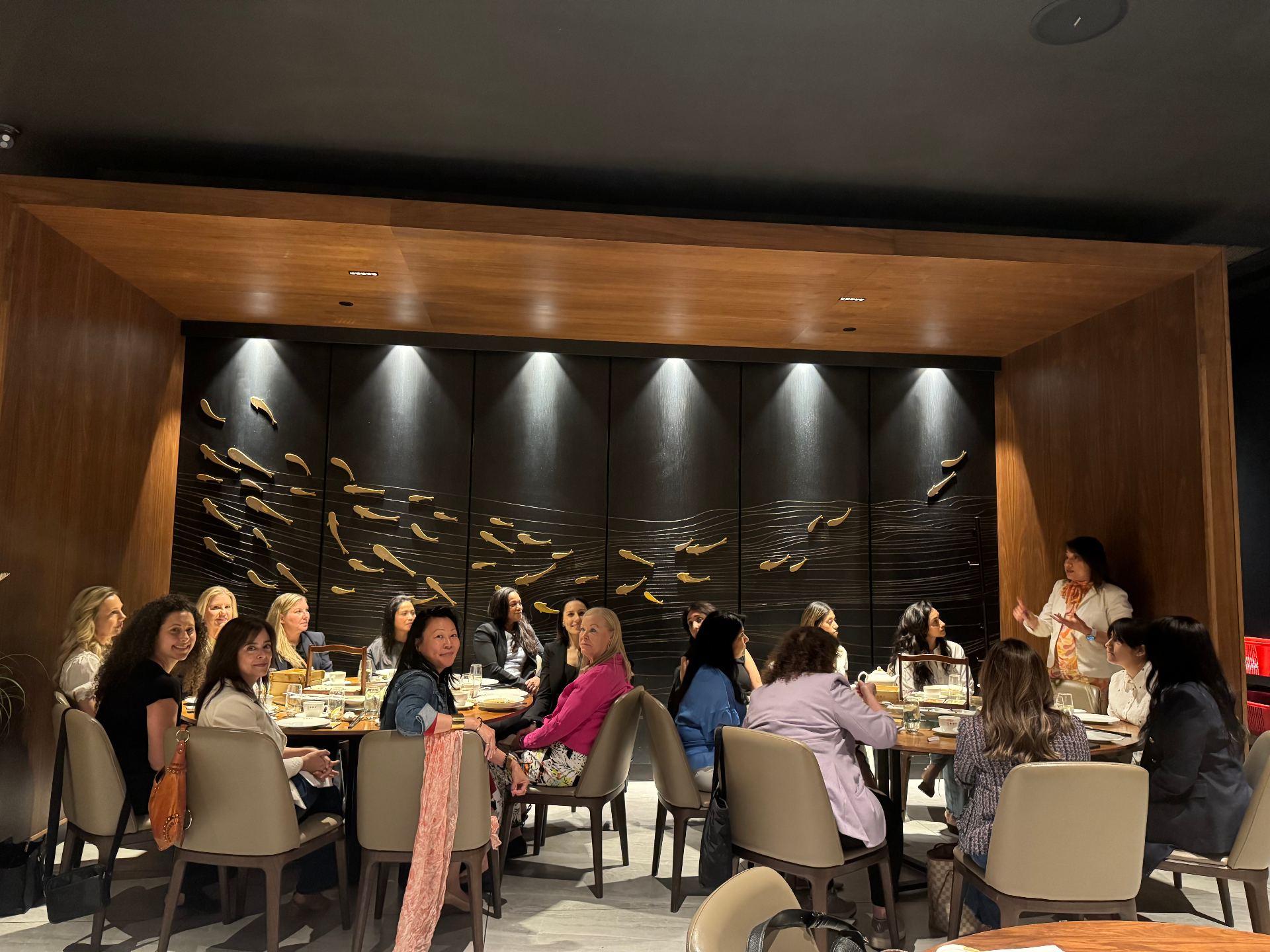 Speaker addressing the room during the Toronto gathering
