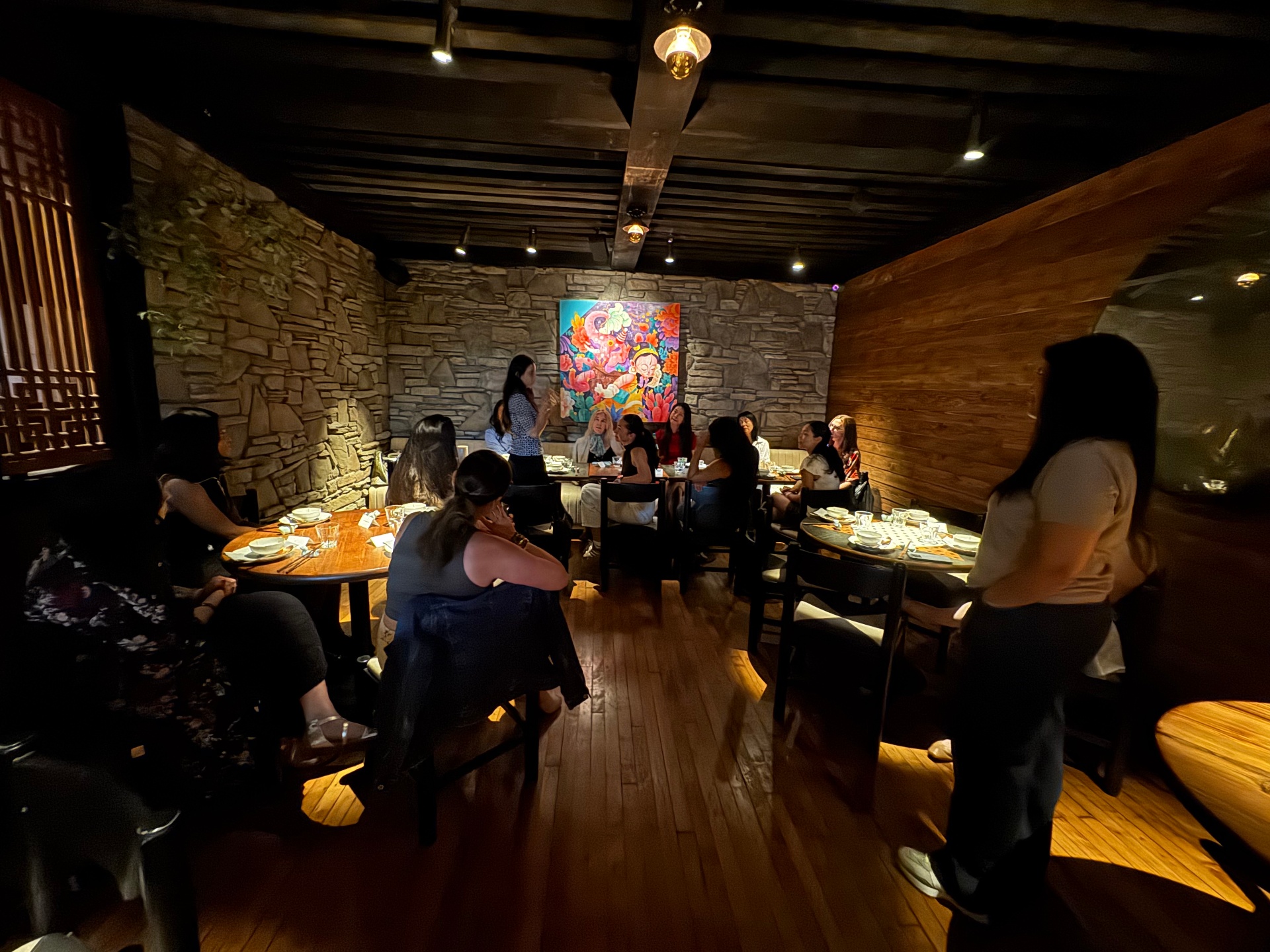 Attendees listening during the New York dinner