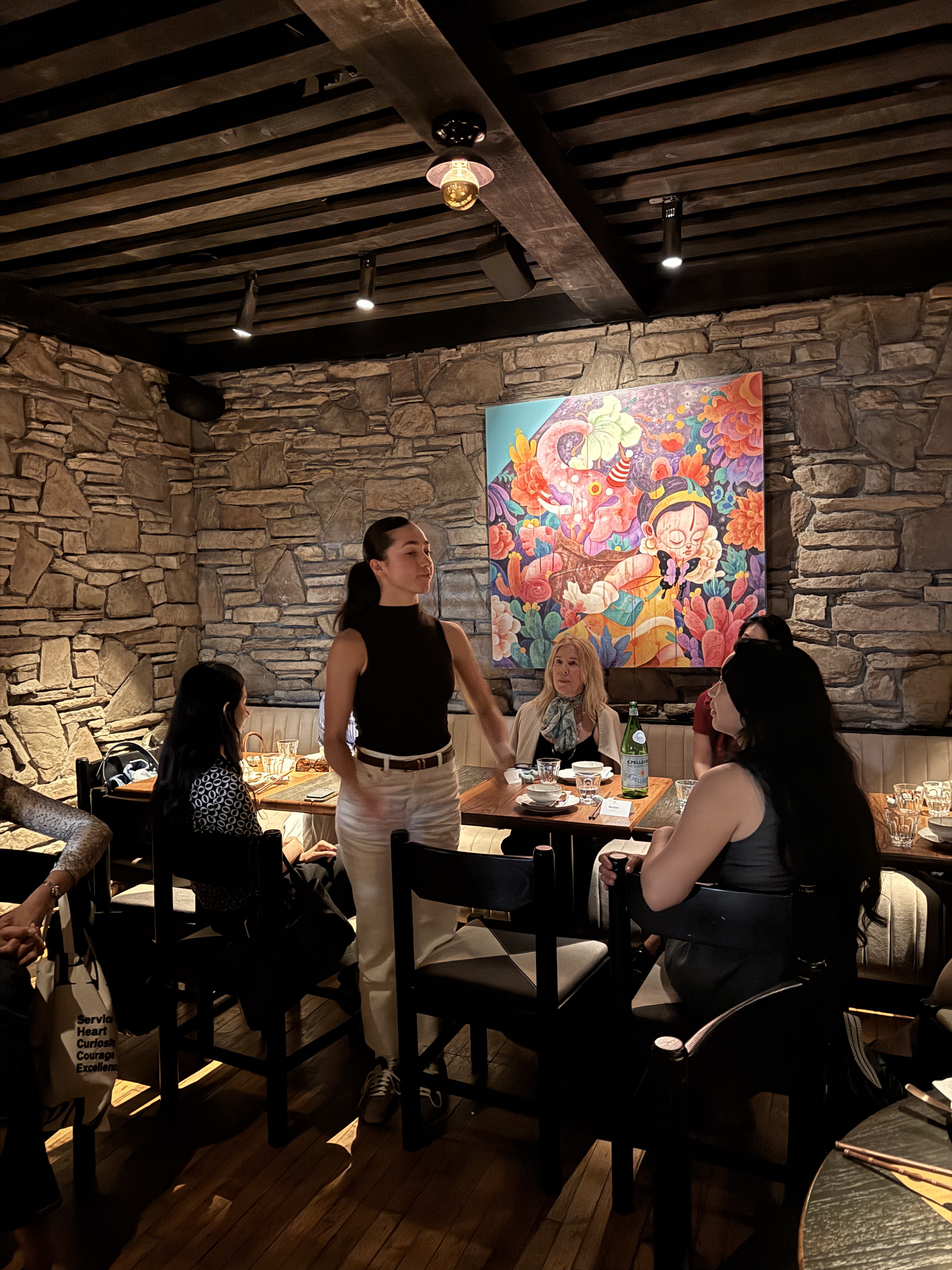 Candid moment from the New York dinner