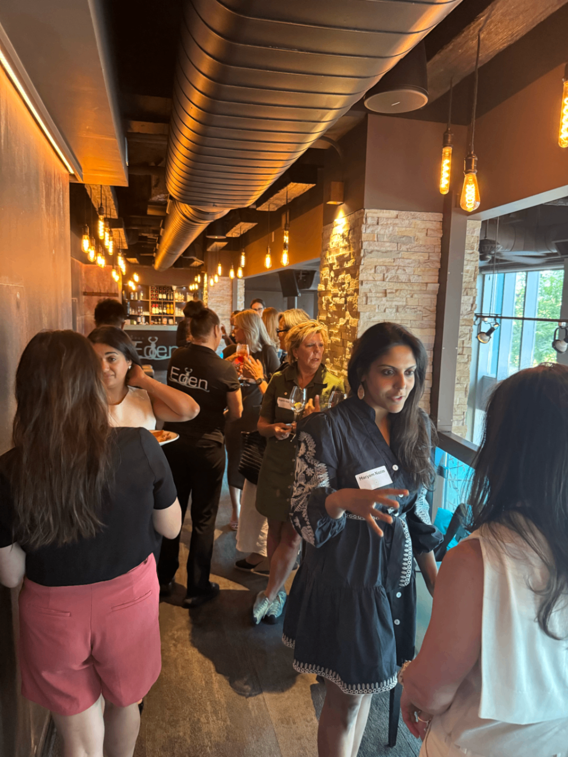 Candid mingling shot from Toronto Summer '26